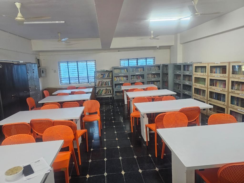 Library reading tables and orange chairs